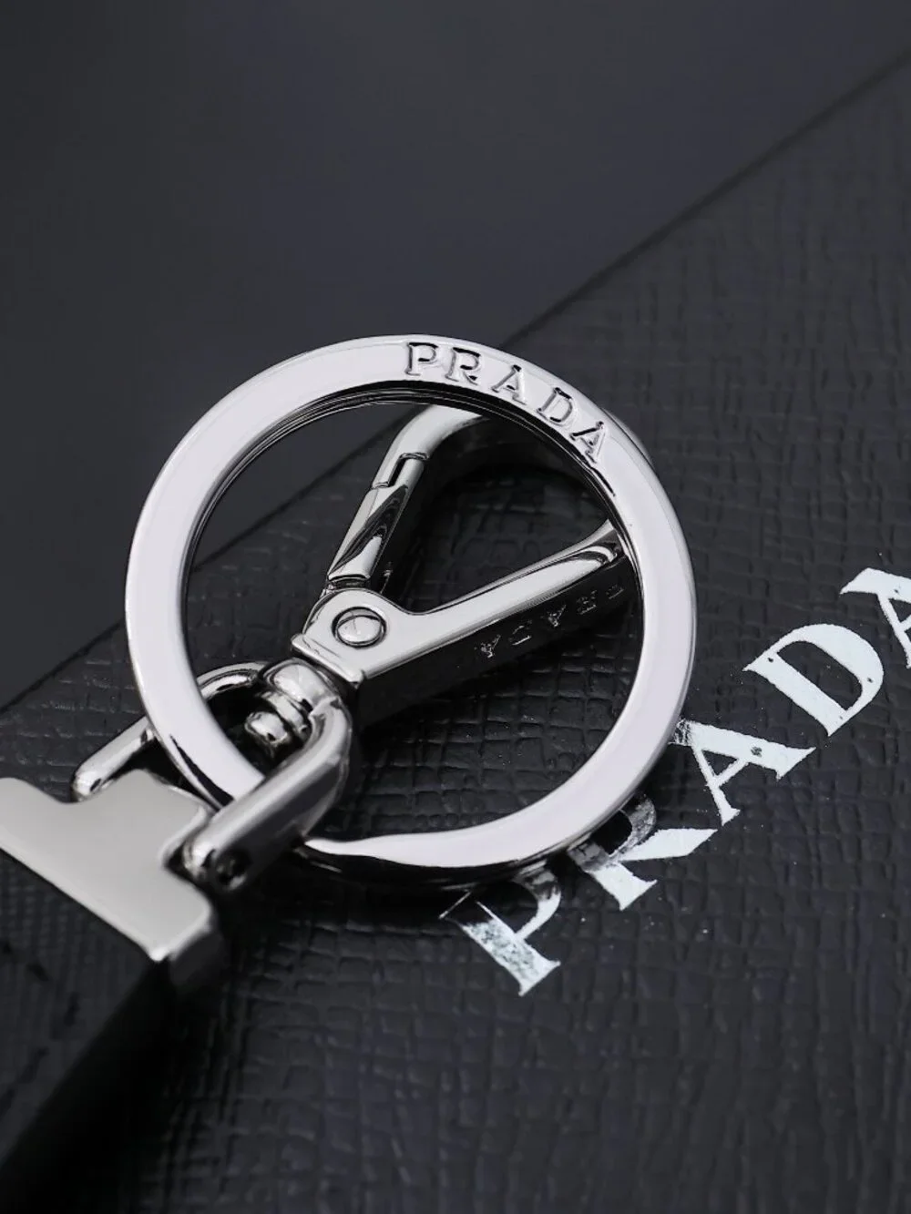 ✨ Prada Black Triangle Logo Leather Keychain
